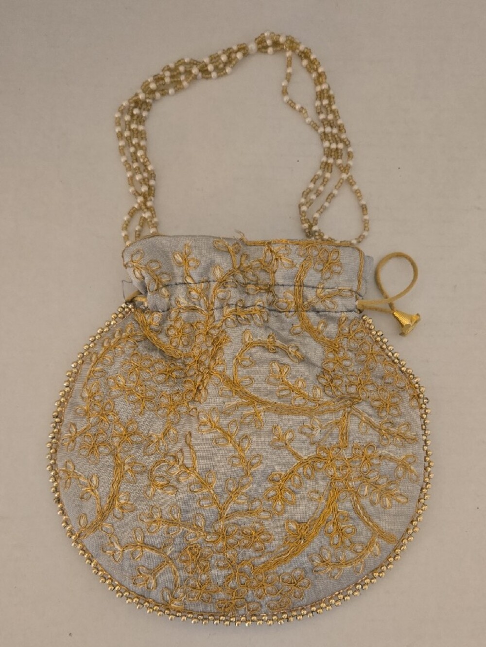 Embroidered Golden Floral Drawstring Pouch Bag
